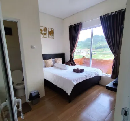 Pucuk Dieng Syariah Inn Отели рядом с достопримечательностью «Telaga Cebong»