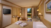 Tevini Dolomites Charming Hotel Hôtels à : Commezzadura