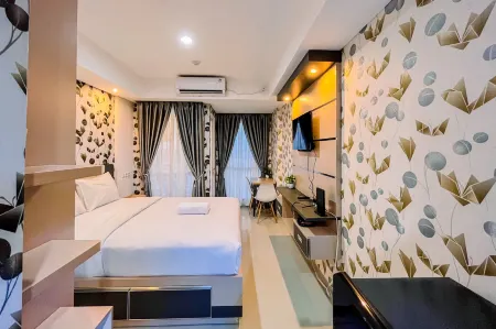 Simple and Cozy Studio Tamansari Skylounge Makassar Apartment Отели в г. Marusu