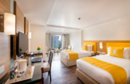 BloomSuites l Ahmedabad Hotels near SG Highway