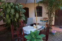 Heuan Lao Guesthouse Отели рядом с достопримечательностью «Ват Симыанг»
