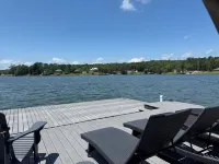 Spacious 6BD 4BA Lakehouse. Sleeps 17. Views. Dock. Paddleboards. Screened Porch