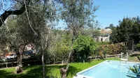 villa surrounded by greenery a few steps from the sea with terrace and garden