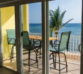 Sea Glass at the Reef - Luxury King Beach Front Condo On The Beach