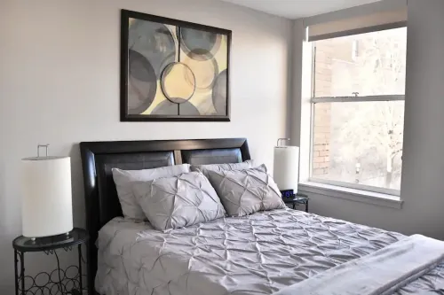 AT YOUR SERVICE! Downtown Aurora 1 Bedroom River Facing Gem