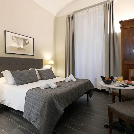 Residenza Vittoria Roma Отели рядом с достопримечательностью «Станция метро Lepanto»