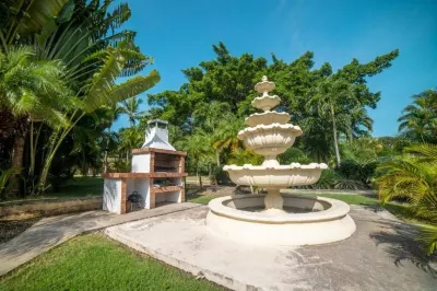 Air-conditioned 1 bed 1 full bath 1 half bath apartment.  Hot Water & generator.