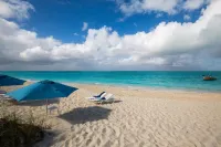 Beach Front Luxury Condo in the Heart of Grace Bay at Villa Renaissance.