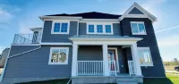 A peaceful cozy three bedroom, home away from home, near Spruce Meadows Hotels near Canadian Tire