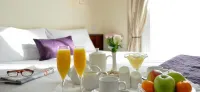 Maples House Hotel - Parkplatz