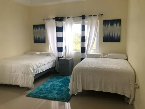 Beachfront Bliss in Portmore 2BR with Ocean Views & Modern Comfort, pool access