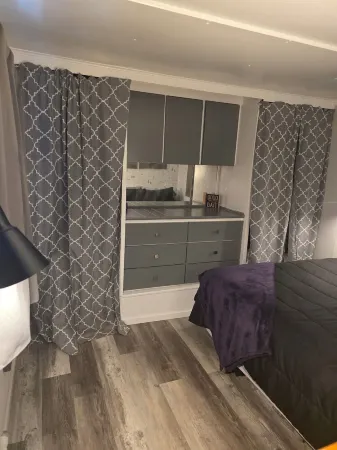 Cozy river cabin with hot tub, great fishing, and peaceful nature views.