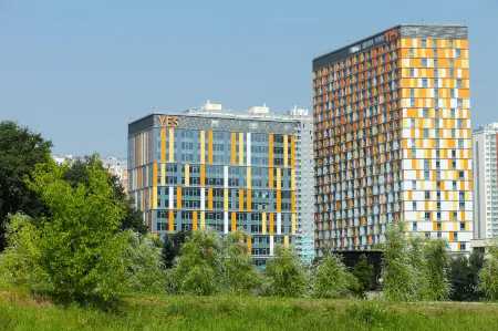 Апарт-отель YES Mitino Отели рядом с достопримечательностью «Самый высокий цилиндрический аквариум в мире»