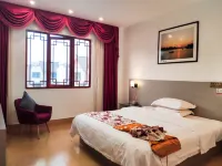 Four Seasons Flower Inn - Inns