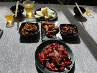 Weixi Manlaiyue Homestay - servizio colazione