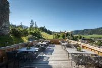 Hotel Schlössl -Dein Hotel in Schladming Отели рядом с достопримечательностью «Schildlehen 79, 8972 Ramsau am Dachstein, אוסטריה»