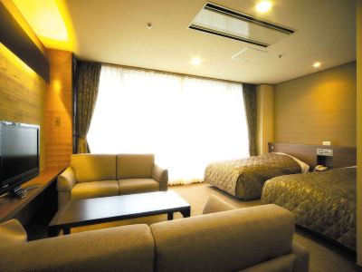 ベッド4台付きバス・オーシャンビュー喫煙ルーム ホテルシーパレスリゾートの写真