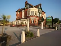 戈維斯地林克斯飯店 住宿飯店