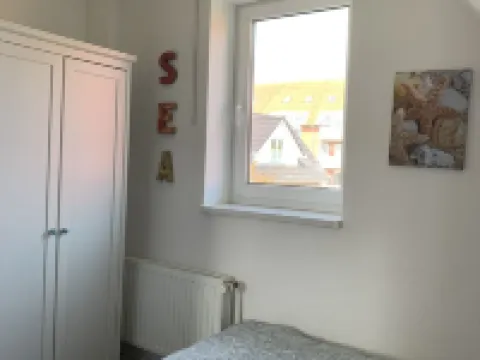 150m to the beach with private beach chair, south-facing garden, WLAN, SAUNA, barbecue, handcart Hotels in Schonberger Strand