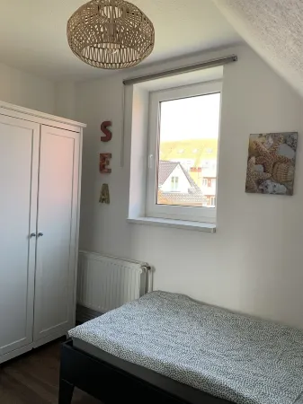 150m to the beach with private beach chair, south-facing garden, WLAN, SAUNA, barbecue, handcart