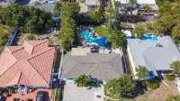 4-Bed Coastal Retreat: Heated Pool, 200 Steps to Beach, Walk to Fun!