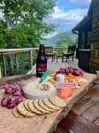 Whispering Falls Cabin - hot tub, views, 15 acres, minutes from Main St.