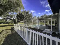 Four Beds, three baths, heated pool, and a Golf Course. What more do you need!!