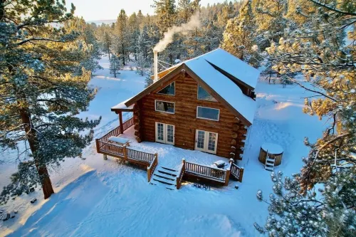 Custom log cabin tucked away in private forest