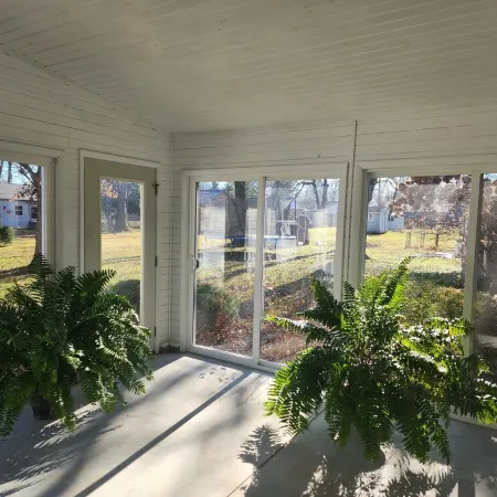 New listing! Private 3 bedroom 2 bath home with BEAUTIFUL sunroom!