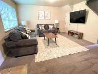 Spacious fully loaded 4-bedroom townhome sleeps 12 freeway access next to BYU Hotels in Springville