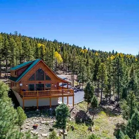 Incredible Views! Stunning log home w/ wrap around deck and covered porch
