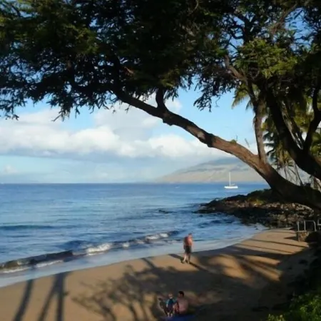 Enthralling Sunset Views from Top-Floor Remodel Steps from Maui's Best Beaches.