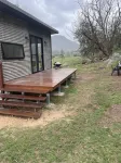 Brand new cabin with cliff views, hiking trails, heated spa, farm stay