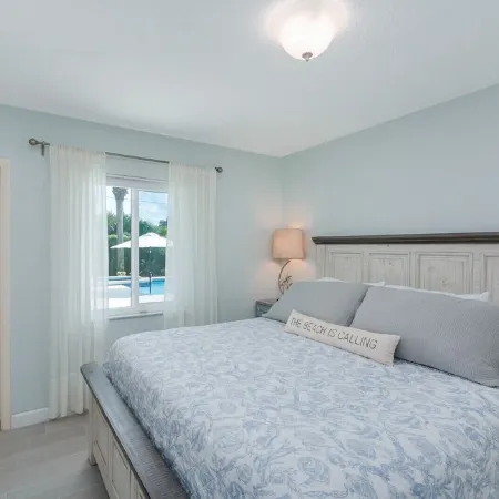 Private Retreat heated pool and spa steps from beach