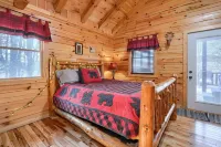 Bear Hugs cabin nestled in the woods.