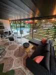 Modern Vacation Home with pool- Conveniently located to Restaurants & Beach