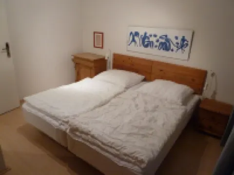 Holiday apartment on the beach in a traditional thatched-roofed house