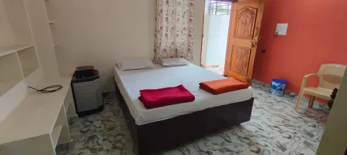 Vasavi Family Stay Hampi Hotels in Kamalapur