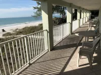 Completely remodeled beach front condo with full ocean views, steps to the water
