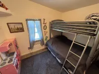 Hidden in the trees!Reasonable Rates-Sleeps 12-Includes kayak for 4.New listing!