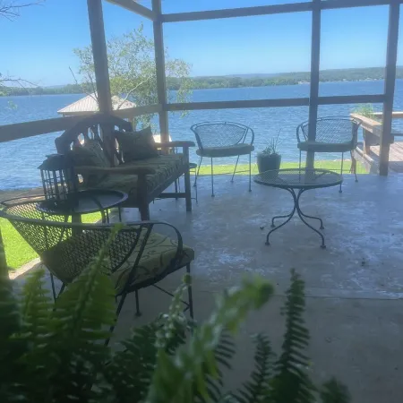 Lakefront home on the main channel w/ beautiful view and a boat ramp next door!