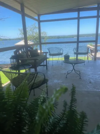 Lakefront home on the main channel w/ beautiful view and a boat ramp next door!