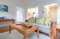 The Hideaway, a cozy historic cottage tucked away in the heart of downtown WPB!