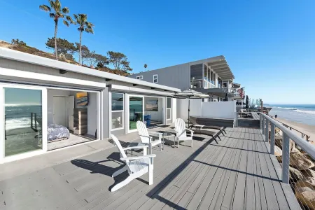 Oceanfront Retreat: 2BR Home with Private Beach Access, Firepit & BBQ