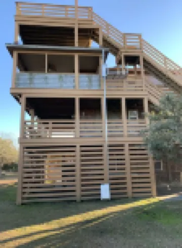 4X4 only! Canal front. Ocean AND sound views! Decks and porches on all levels.