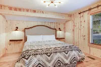 Only Minutes to Attractions with Indoor Sauna, Hot Tub, Games, and Fireplace!