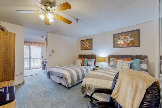 Inviting condo with high-speed WiFi and shared indoor pool - two miles to beach