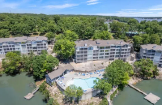 Two Balconies and Community Pools - Stunning Lakefront Haven