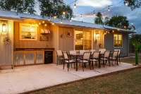 Spacious Backyard with Fire Pit and Outdoor Bar - Charming Oasis Hotels near Main Plaza