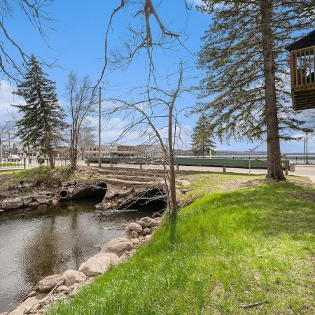 Downtown Boyne City charmer with stunning Lake Charlevoix and Boyne River views.